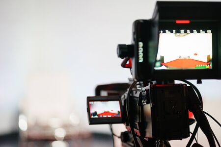 Professional equipment for shooting and broadcasting video. Electronics and television broadcasting devices. Video shooting in the studio. Soft focus.の写真素材