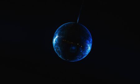 Mirror disco ball under the ceiling in a nightclub. Night life and lighting. Black background and soft focus.の写真素材