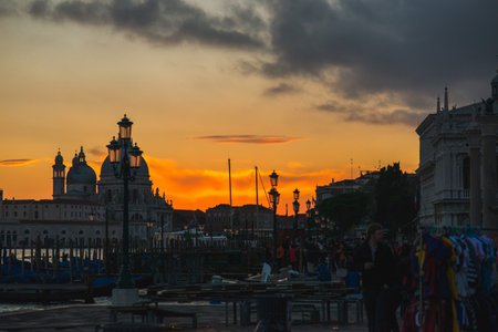 View of the Grand Canal and Basilica di Santa Maria della Salute in Venice during sunset....