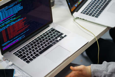 Developer of program code. Process of writing code in a special application.の写真素材