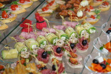 Catering and guest meals during the event. Quick mini snacks in a special beautiful dish.の写真素材