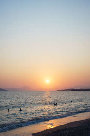 Sunset on the sandy beach with sea view. Seascape.の写真素材