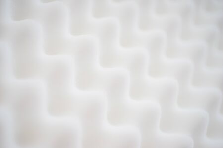 White gradient abstract background many waves different angles. Extremely soft focus blur foreground and background. Soundproof sound absorbing materials. Biological style, modern technology, bionics.の写真素材
