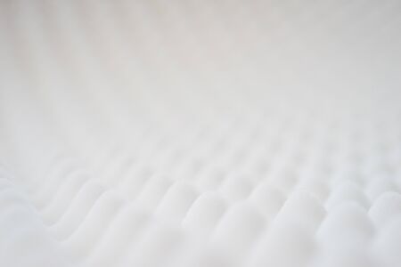 White gradient abstract background many waves different angles. Extremely soft focus blur foreground and background. Soundproof sound absorbing materials. Biological style, modern technology, bionics.の写真素材