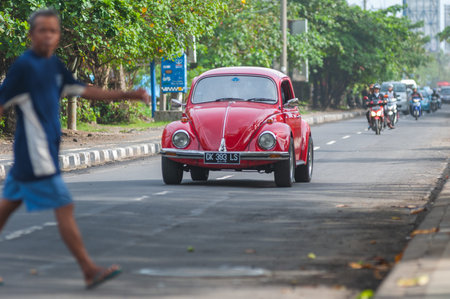 KUTA, BALI, INDONESIA-APRIL, 2020: City landscape, view of narrow streets Asian village crowded...