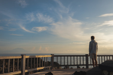Man greets the world at dawn.