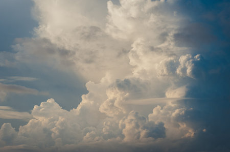 Large white cumulus clouds against a blue sky. Closeup of clouds in the sky. Seascape, travel to the...