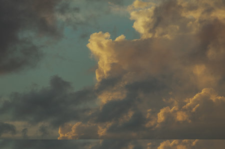 Magical dramatic sunset on a tropical beach. Seascape, ocean waves and bright clouds in the sky....