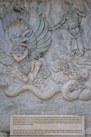 BALI-APRIL, 2020: Garuda Wisnu Kencana Cultural Park on island Bali. Details of exposition, general views. Travel to Indonesia, attractions. Old limestone quarry and largest monument on the island.のeditorial素材