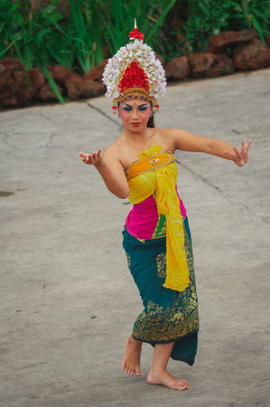 BALI-APRIL, 2020: Garuda Wisnu Kencana Cultural Park on island Bali. Traditional Balinese dance Kechak, dancers tell a story, dancing with eyes, fingers and limbs. Performance on stage.のeditorial素材