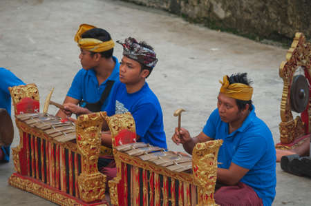 BALI-APRIL, 2020: Garuda Wisnu Kencana Cultural Park on island Bali. Traditional Balinese dance Kechak, dancers tell a story, dancing with eyes, fingers and limbs. Performance on stage.のeditorial素材
