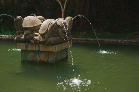 BALI-APRIL, 2020: Garuda Wisnu Kencana Cultural Park on island Bali. Details of exposition, general views. Travel to Indonesia, attractions. Sculptures of gods and demons carved from stone.のeditorial素材