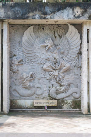 BALI-APRIL, 2020: Garuda Wisnu Kencana Cultural Park on island Bali. Details of exposition, general views. Travel to Indonesia, attractions. Old limestone quarry and largest monument on the island.のeditorial素材