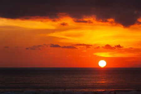 Stunning dramatic sunset over the ocean.の写真素材