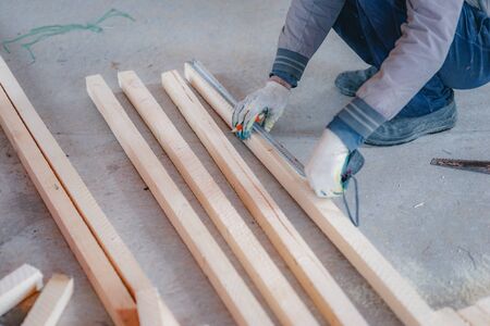 Wooden blocks on the floor during woodwork.の写真素材
