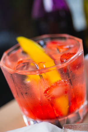 glass with a refreshing drink on the table in a restaurant.の写真素材