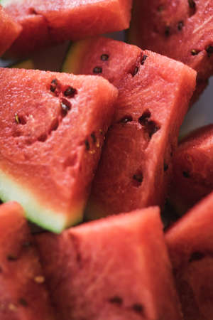 Bright red fresh watermelon slices top view.の写真素材