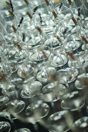 Abstract composition of glass goblets with flowers.の写真素材
