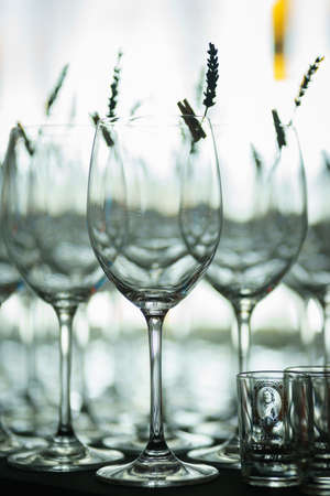 Abstract composition of glass goblets with flowers.の写真素材