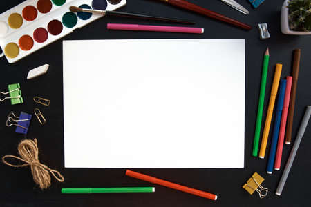 Stationery set on black background. School supplies top view for advertising and promotional items. Back to school conceptの写真素材