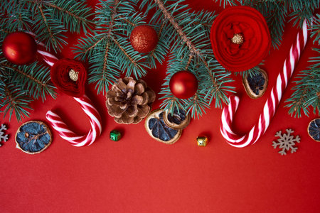 Merry Christmas and Happy New Year greeting card. Xmas holiday red background with copy space for...