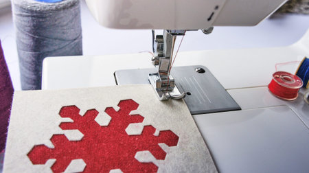 electric sewing machine with thread and bobbin