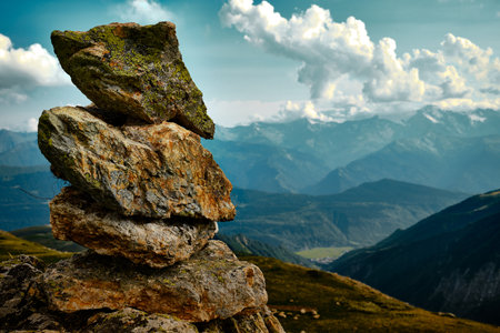 Mountain ranges on a sunny day in Georgia. Sky with clouds adn hills. tower of stonesの写真素材
