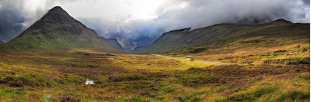 highlands valley of scotland with mountainsの写真素材