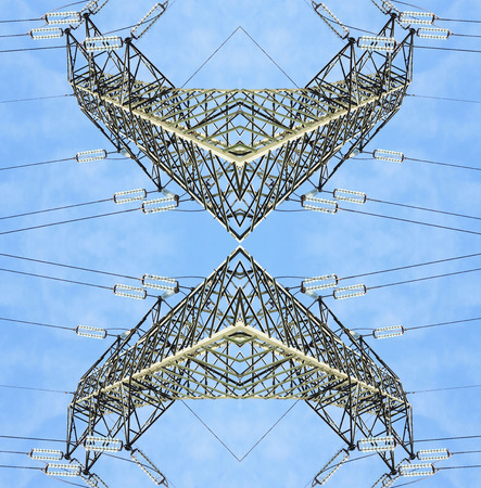 symmetrical surreal high voltage pylonsの写真素材