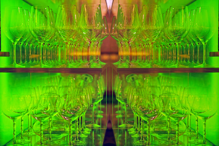 crystal glasses  lined up in illuminated plexiglass display  caseの写真素材