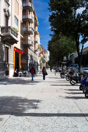 People stroll along the corso porta nuovaのeditorial素材