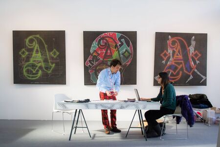 Bologna,Italy- people walk and look at works of art in an exhibitionのeditorial素材