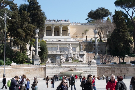 Rome,Italy-March 16,2013 Tourists walking in Piazza del Popolo in Rome, and admire its beautyのeditorial素材