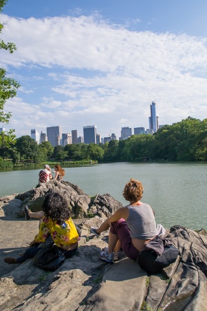 New York City, USA - August 3, 2013 view of some skyscrapers from one of the many lakes found in central park in new york people come here to relax and practice outdoor sportsのeditorial素材