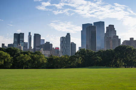 New York City, USA - August 3, 2013 view of some skyscrapers from one of the many lakes found in central park in new york people come here to relax and practice outdoor sportsのeditorial素材