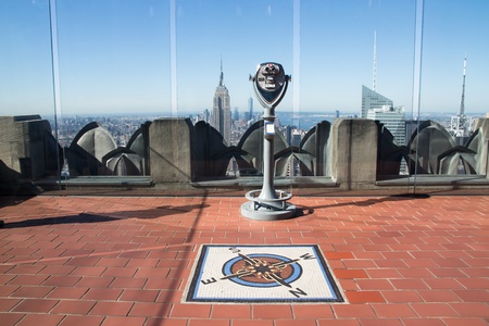 binoculars on rockefeller center c with the city of New York from the topの写真素材