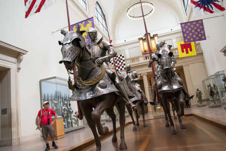 New York,USA -august 7,2013 many people stop to admire the riders on parade at the Metropolitan Museum in New Yorkのeditorial素材