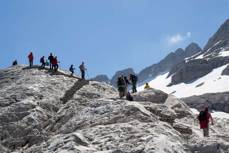 people walking on the Marmolada and admire the sceneryのeditorial素材