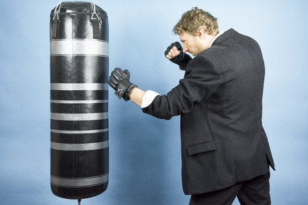 Business man preparing to fight in the world of financeの写真素材