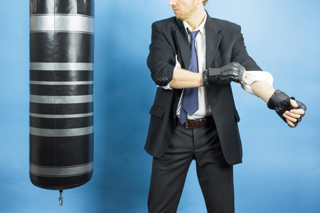 Business man preparing to fight in the world of financeの写真素材