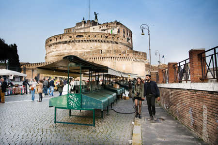 Rome,Italy-March 15,2014 Tourists stroll among the stalls near Castel Santのeditorial素材
