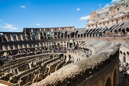 Rome,italy-April 17,2014 people admire the interior of the ancient roman coliseum in the sunny day in the center of Romeのeditorial素材