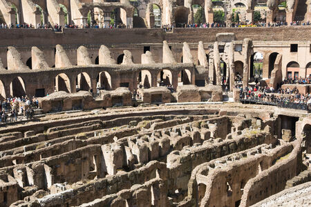 Rome,italy-April 17,2014 people admire the interior of the ancient roman coliseum in the sunny day in the center of Romeのeditorial素材