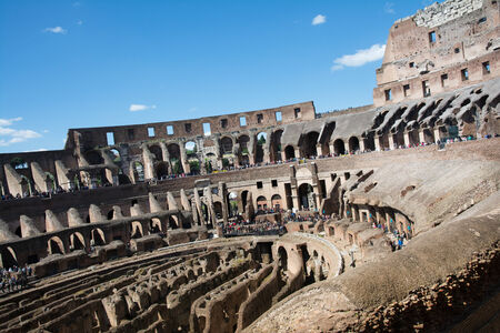 Rome,italy-April 17,2014 people admire the interior of the ancient roman coliseum in the sunny day in the center of Romeのeditorial素材