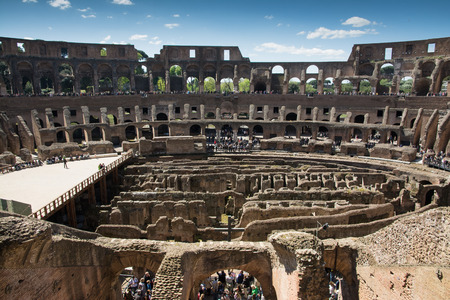 Rome,italy-April 17,2014 tourists admire the interior of the ancient roman coliseum in the sunny day in the center of Romeのeditorial素材