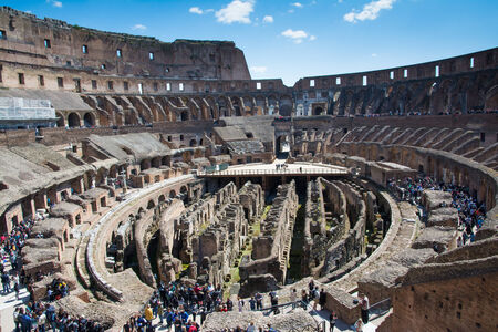 Rome,italy-April 17,2014 tourists admire the interior of the ancient roman coliseum in the sunny day in the center of Romeのeditorial素材