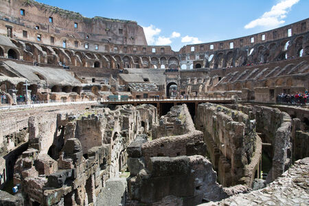 Rome,italy-April 17,2014 tourists admire the interior of the ancient roman coliseum in the sunny day in the center of Romeのeditorial素材