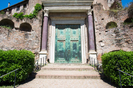 particular of the bronze door of the temple of romolo in the roman forumの写真素材