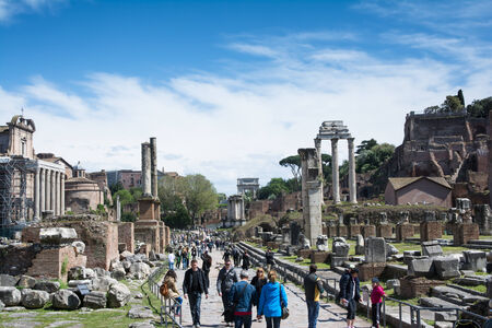 rome,italy-April 17,2014 tourists stroll admiring the majesty of the Roman Forum in a sunny day in Romeのeditorial素材