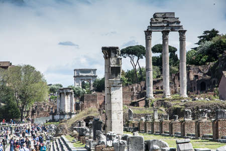 rome,italy-April 17,2014 tourists stroll admiring the majesty of the Roman Forum in a sunny day in Romeのeditorial素材